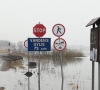 Potvynis Rusnėje smarkiai išsiplėtė, eismas draudžiamas, o žmonės perkeliami